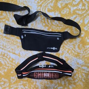 NWOT Shokz Black and Orange Running Belt Set